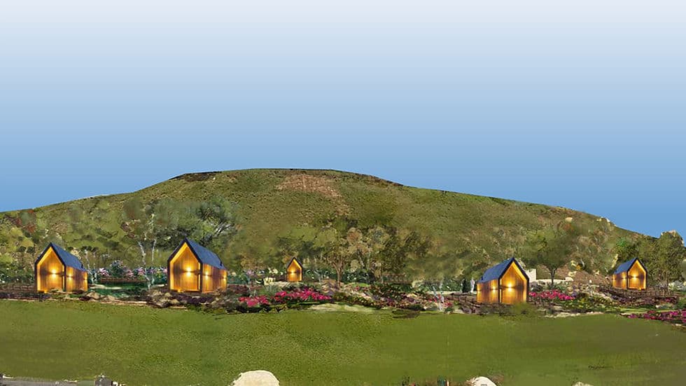 Little Rock micro bungalow bathroom featuring walk-in shower and vanity