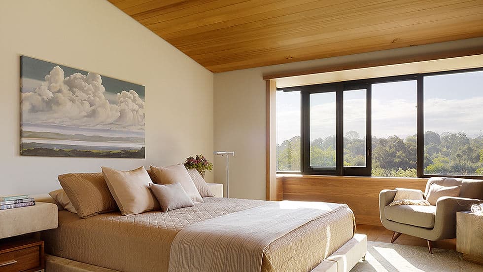 Little Rock micro bungalow bedroom nook with warm lighting