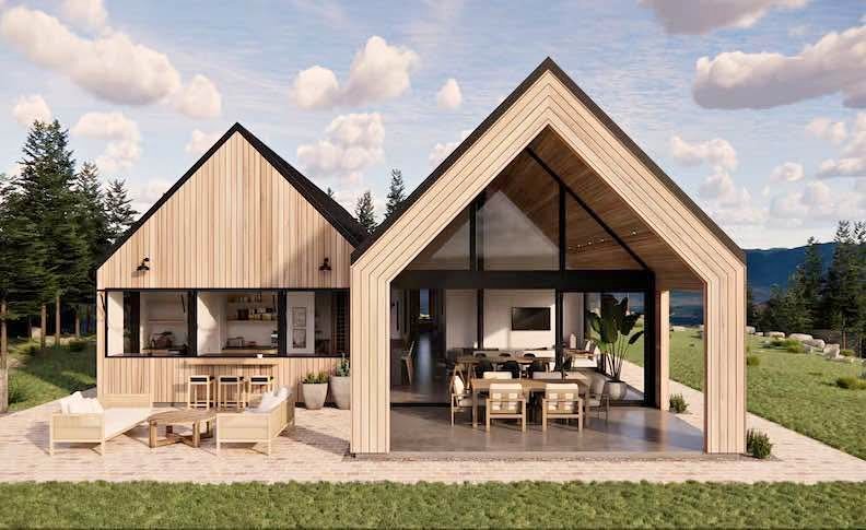 Open-concept living and dining area with panoramic mountain views, modern furniture, and natural lighting